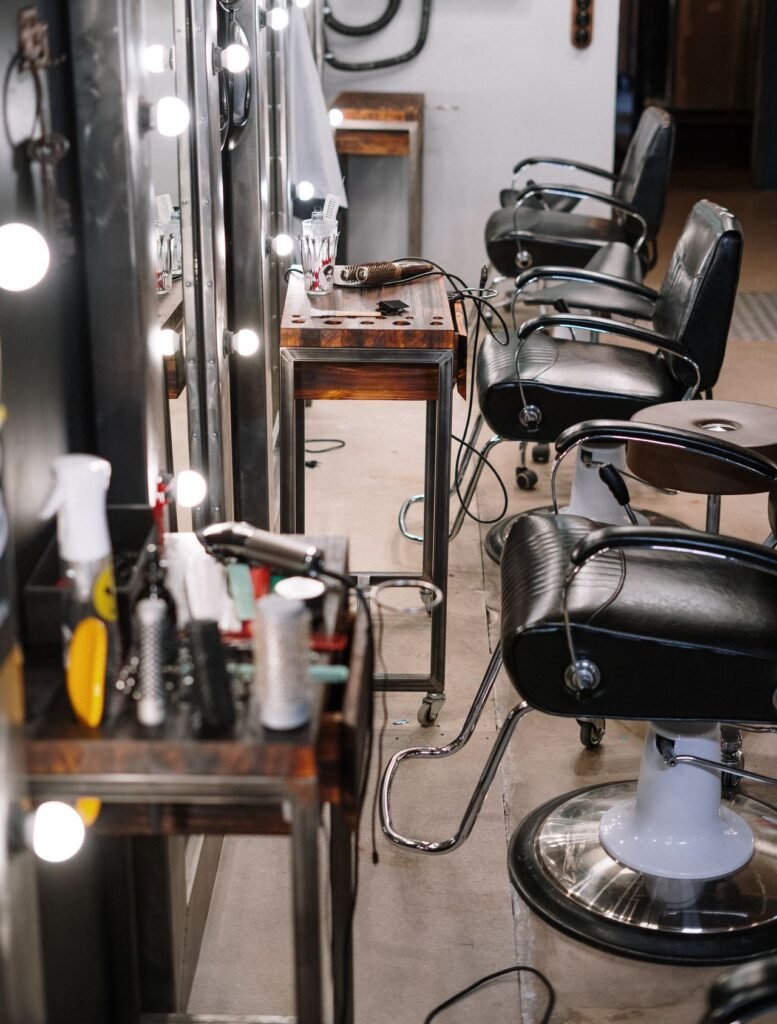 Bright modern hair salon interior with styling chairs and mirrors