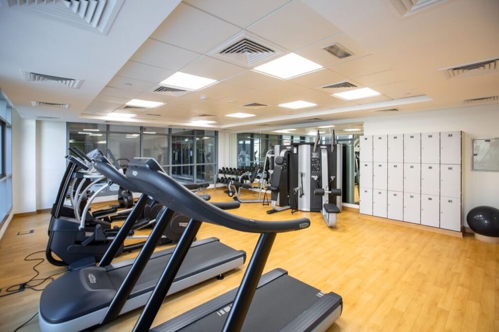 Spacious gym interior with treadmills and fitness machines